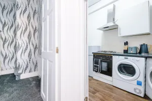 Image of 65 Inch TV & Luxurious 2 Bedroom Suite for Your Ultimate Getaway