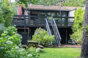 Image of Typical wooden chalet in the Marina, facing the lake