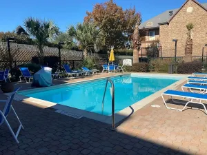 Image of Enjoyable Stay! Outdoor Swimming Pool, Minutes’ Drive to Dallas World Aquarium!