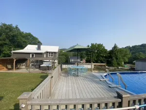 Image of The Blue Heron · Walk to the Falls! Celebrate Summer! Pool, Hot Tub & Fire Pit!
