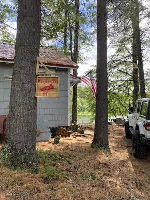 Image of Lakeside home. Fishing, paddle boarding, swimming, and easy lake  fun.