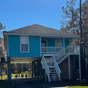 Image of Coastal getaway with swimming pool basketball pickleball and boat launch access
