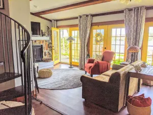 Image of 🏡Historic Cottage in LeClaire w\/full river views and 3 decks. Dogs welcome 🐶