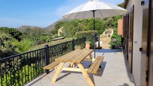 Image of Pretty house with swimming pool between sea and mountains