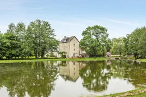Image of Old mill from the 19th century and its pond in the heart of the Châteaux of the Loire Valley