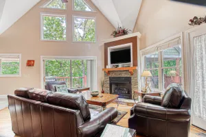 Image of Dog-friendly house w\/ private hot tub, gas fireplace, game room, & much more
