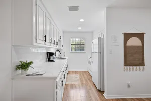 Image of Cheerful 2 Bedroom Cottage with Parking + Wifi