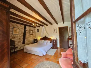 Image of Gironde\" guest room, swimming pool and Nordic bath