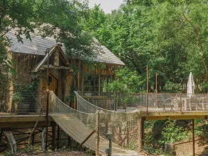 Image of Hobbit Treehouse with waterfall! 350 Acres on the BrazosRiver! \"Magical\"-FW Mag