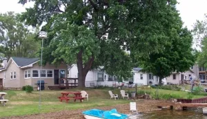 Image of Very Clean Lakefront Home with Sandy Beach and Clear water.