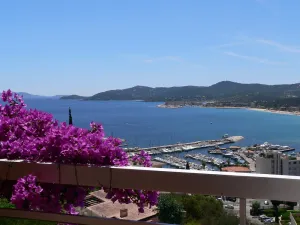 Image of 2 pieces: exceptional view over garden + terrace overlooking the sea and islands of gold
