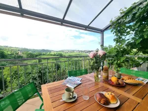 Image of Appartement T2 avec terrasse, parking et wifi à St-Genest-Lerpt - FR-1-496-287