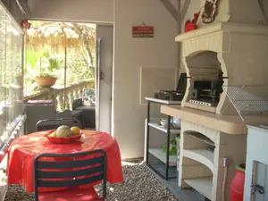 Image of Separate air-conditioned bedroom, summer kitchen with steps and swimming pool