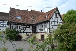 Image of Idyllic half-timbered house with a large garden and playground and orchard