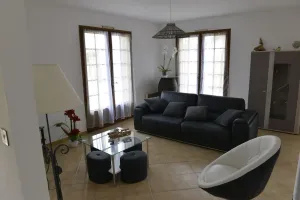 Image of villa ground floor with garden and fenced