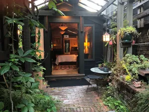 Image of Beautiful and Lush Hidden Wisteria Getaway