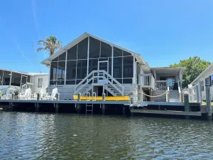 Image of Waterfront retreat with boat dock & private ramp right off the river