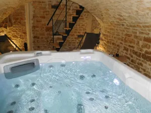 Image of Charming Stone House with Jacuzzi, Forest Walks, and Baby Equipment in Rural Village