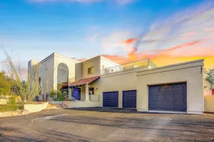 Image of Dazzling retreat with city views, pool, hot tub, bocce ball court, & roof deck