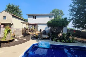 Image of 5-Star 3 bedroom home with heated pool and hot tub! 10 minutes away from MSU