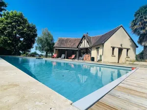 Image of Luxurious Forest Retreat: Tennis, Pool, BBQ, Fireplace & More!
