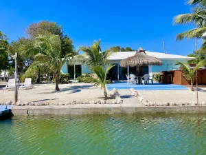 Image of Weekly Discounts! Canal Home with SwimSpa Pool, Walk to Ocean Front Tiki Bars!