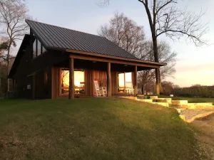 Image of CLARA'S CABIN... a place to unwind, reflect, draw, write, or enjoy your people.