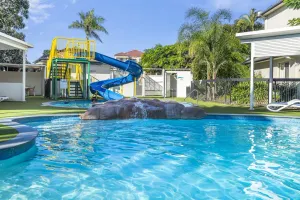 Image of 2-Bed Family Haven with Pools BBQ & Playgrounds