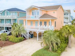 Image of 4 bedrooms, 3.5 bathrooms.  Private walkway to beach at the end of the street.