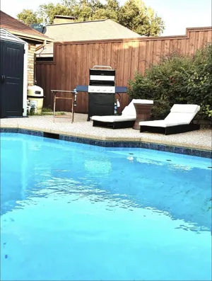 Image of awesome pool house with gym and spa
