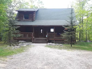 Image of A beautiful log cabin home on Lake Huron, amazing lake views, hot tub, game room