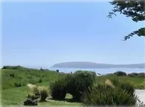 Image of Windsong - Romantic Retreat with Ocean View and Hot Tub located near 14th green.