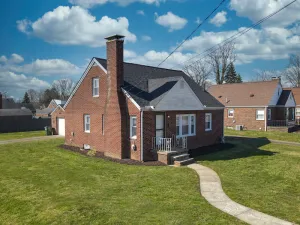 Image of End Zone Escape-Light and Bright HOF Village Home