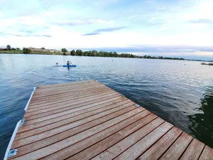 Image of Lakefront Getaway. Private Waterfront Home with Dock and Sunroom.