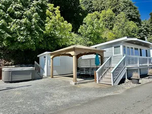 Image of Waterfront Cabin on Camano Island with hot tub and outdoor patio.