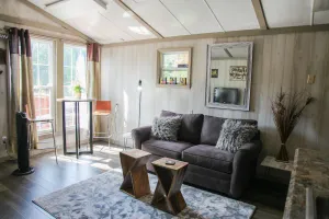 Image of Relaxing, tiny cabin in the woods over a beautiful lake
