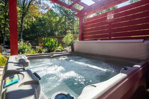 Image of Romantic Waterfall cabin-Hot Tub-Coffee & Tea Bar-Fire Pit