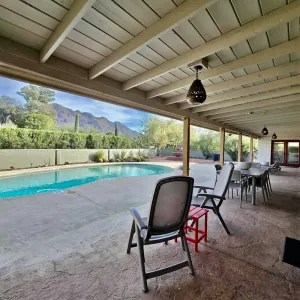 Image of @TucsonMuralHouse w/pool & hot tub on golf course