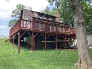 Image of Scenic waterfront Log cabin home near Gettysburg