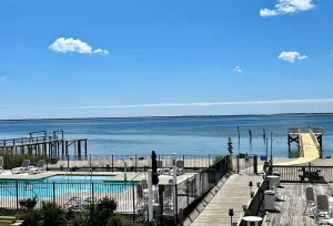 Image of On the picturesque SPT Waterfront!  Beautiful Pool & Private Beach!