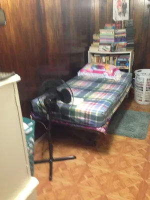 Image of Room with TV,desktop,closet,bed,chest of drawers. Can sleep two comfortably.