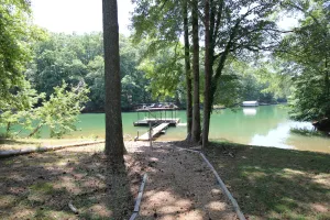 Image of Quiet lake cove home with single slip dock