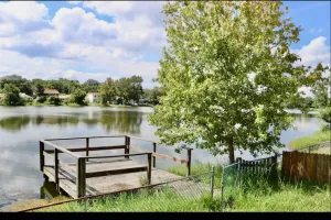 Image of Lake house scenic view with close proximity to the beach and necessities