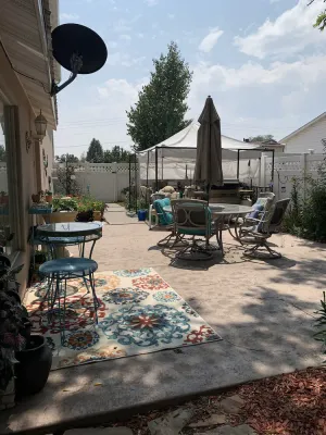 Image of Cozy Victorian home with inviting front porch and fenced back yard pet friendly.