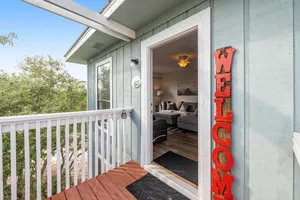 Image of Newly renovated condo with balcony, pool, WiFi, & beach across the street