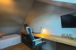 Image of Separate bedroom with kitchenette