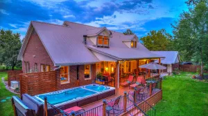 Image of Country Charmer with Inviting Front and Back Porches, Swim Spa, Decks, Fire Pit