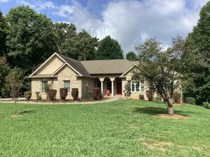 Image of Home on secluded 5 acres with private dock on TN river 100 yards from house.