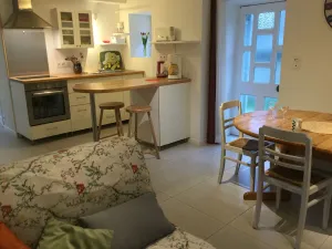 Image of small stone house in a character site