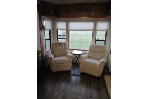 Image of Delightful 5th wheel w\/ queen bed, patio deck, and high speed internet.